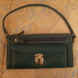 Wristlet with wallet inside